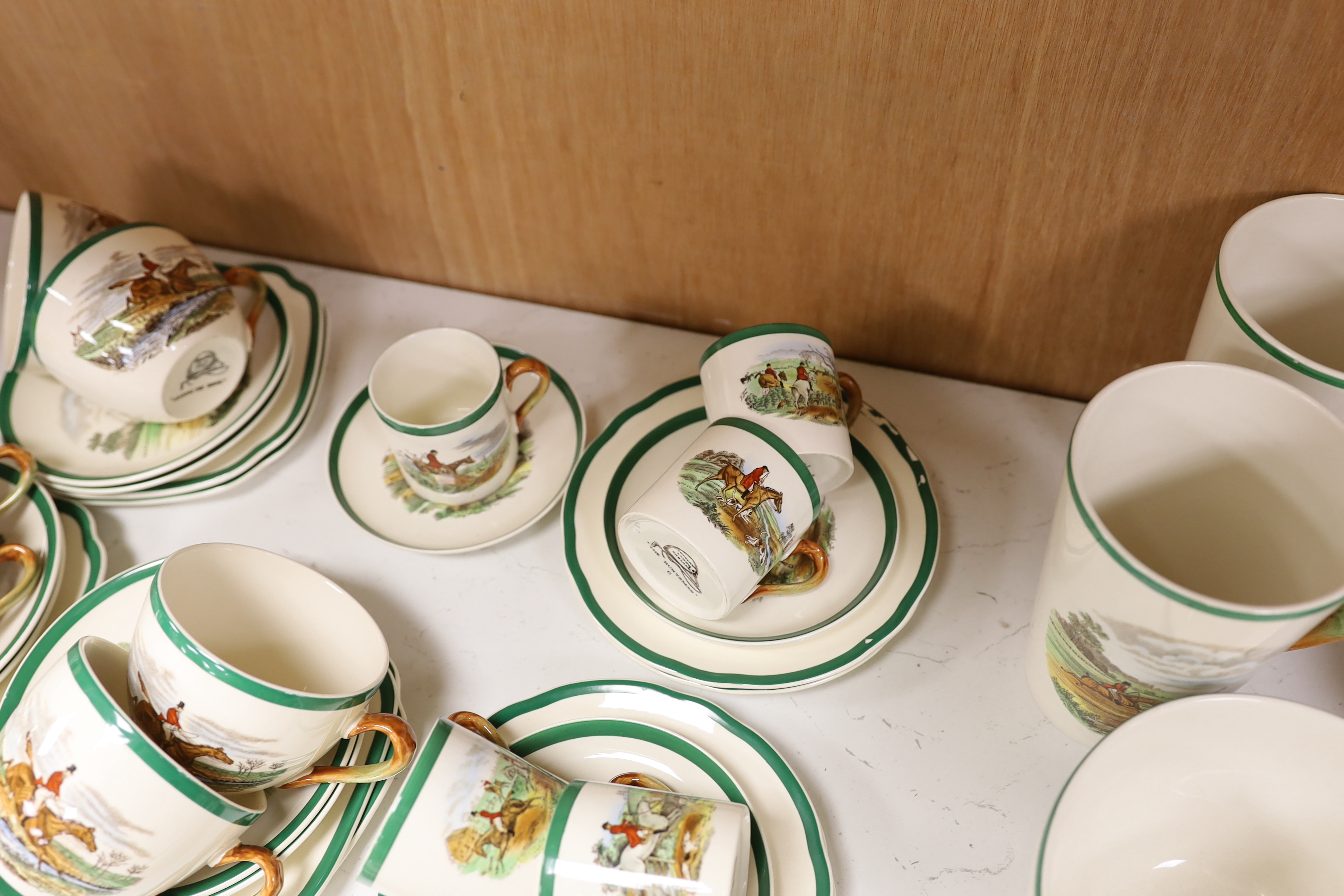 A Copeland Spode hunting pattern tea / coffee set including coffee pot, tea pot and trios, together with a Bavarian floral porcelain coffee pot, largest 22cm high